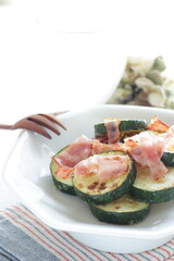 Chinese food, cucumber and bacon stir fried with copy space