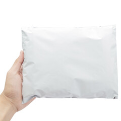 Obraz premium Hand holding blank white plastic bag package mockup, Cutout.