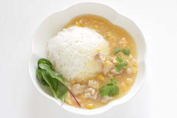 Chinese food, Chicken and sweet corn soup rice in white plate 