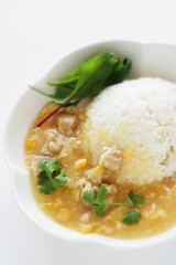 Chinese food, Chicken and sweet corn soup rice in white plate 