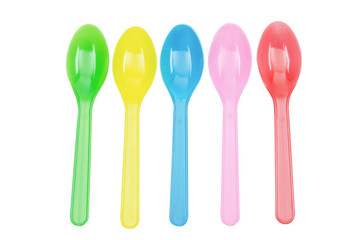 Colorful plastic spoons collection for party isolated on white