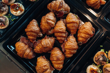 Croissants and snacks on the table top view, catering 