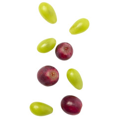 Falling green and red grapes, Cutout.