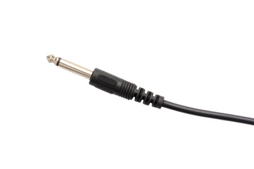 Guitar audio jack with black cable isolated on white background.