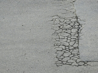 crack on asphalt road texture