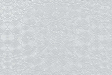 Embossed white background, ethnic vintage cover design. Geometric abstract 3D pattern, hand drawn, doodling tribal texture. Exotic ornaments of the East, Asia, India, Mexico, Aztecs, Peru.