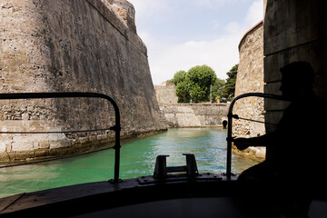 View from a tourist boat of the Royal Walls of Ceuta and its navigable moat