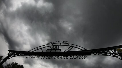Williams, Arizona, USA, June 24, 2022: DOLLY SHOT - Entrance sign leading to Williams a destination known as a gateway to the Grand Canyon and for Historic Route 66.