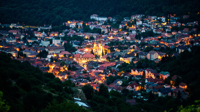 Aerial drone view of the Saint Nicholas Church in Brasov at night, Romania