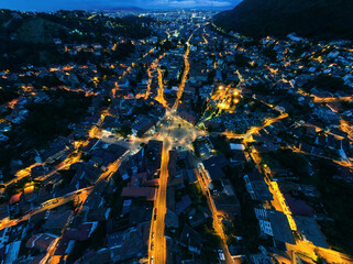 Aerial drone view of Brasov at night, Romania