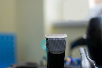 Shaving machine for the groomer at the veterinarian clinic background. Dog grooming accessories for animals. Close up view. Stock photo