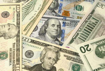 Randomly lying banknotes of us dollars. Dollar background