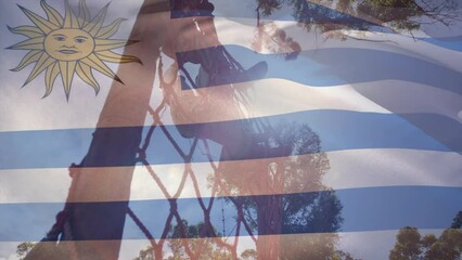 Animation of flag of argentina over diverse woman and man during obstacle race training - Powered by Adobe