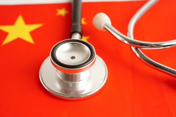 Black stethoscope on China flag background, Business and finance concept.