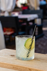 Mai Tai rum cocktail in an outdoor setting.