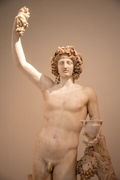 Ancient naked statue of Bacchus