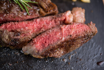 Delicious beef steak served with french fries with parmesan and rosemary