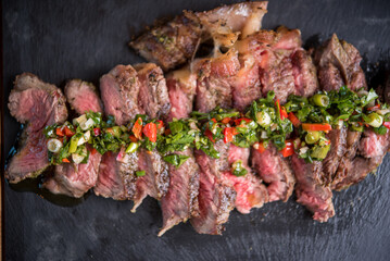 Delicious beef steak served with french fries with parmesan and rosemary