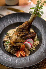Duck leg with rice and vegetables
