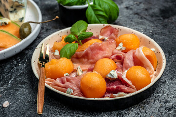 appetizer with sweet melon and ham, dorblu stilton dairy product, blue cheese roquefort gorgonzola, roquefort, cambozola, Food recipe background
