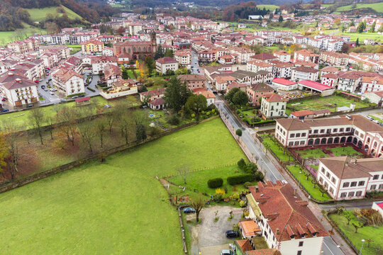 Residential buildings at riverside in picturesque countryside