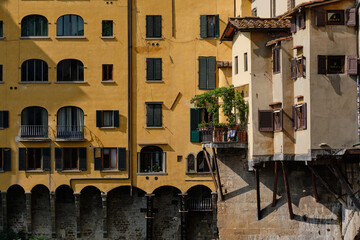 Fototapeta na wymiar Details of the historic Ponte Vecchio in Florence in Italy. One of the most visited places by tourists in the city