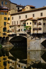 Fototapeta na wymiar Details of the historic Ponte Vecchio in Florence in Italy. One of the most visited places by tourists in the city