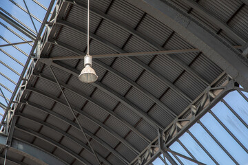 Fototapeta premium Skylight with light in an old train depot, roof background