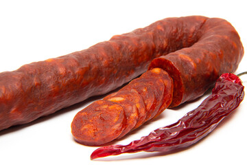 Spanish chorizo sausage on white background