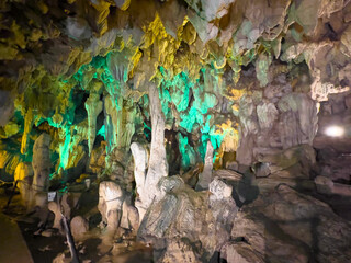Caves and waterfalls Vang Vieng Laos a beautiful city on the river with huge rising mountains and slow flowing river. 