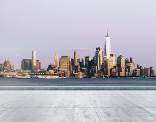 Empty concrete dirty embankment on the background of a beautiful NY city skyline at morning, mock up