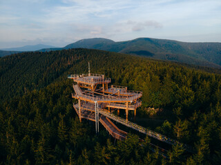 A mountain watchtower Stezka Valaska in Beskydy natural preserve in the Czech Republic. High quality photo - 522529565
