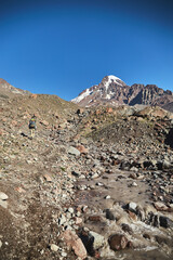 Mount Kazbek and Glacier stream. Nature of Caucasian mountains. Road to the base camp Kazbek, Georgia. Mount kazbek alpinist expedition