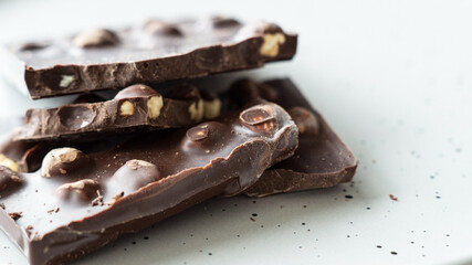 Pieces of black chocolate background