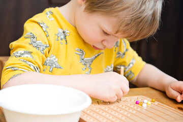 Montessori Beads Board. Learning to count and write numbers, prepare child for mental arithmetic, develop a sense of order, focus, coordination and accuracy.