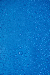 Water drops on blue background.
