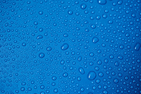 Water drops on blue background.