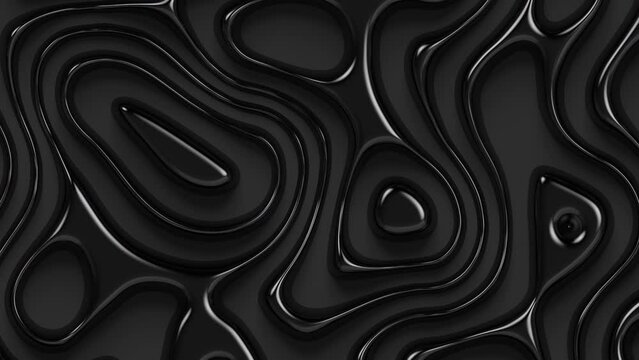 Wavy abstract surface. Close-up of a shiny smooth black liquid. Looped animation 4k.