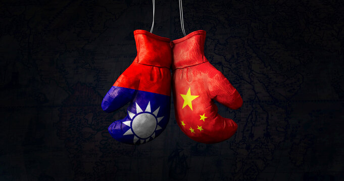 Hanging boxing gloves with the National Flag of the People's Republic of China and flag of the Republic of China illustrate the tensions between the two countries - 3d illustration