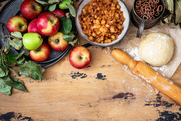 Making rustic  style apple strudel, top view on table with ingredients	