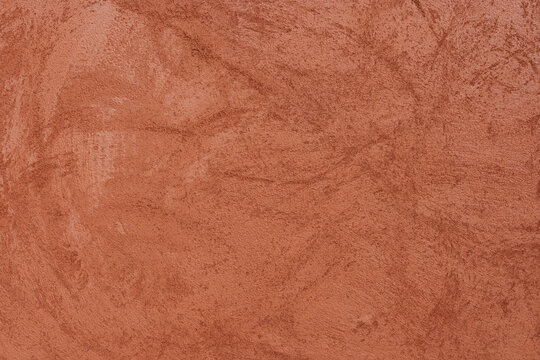 Orange-brown cement wall texture background, wallpaper abstract grunge pattern surface retro backdrop.