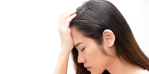Fototapeta premium Close up Asian beautiful woman touch head by hand with feeling worried. Metal concept and Broken heart.