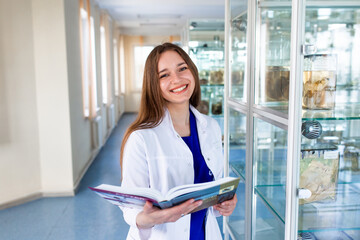 A student of the medical university in the anatomical museum. A future nurse in the office of a nursing school.