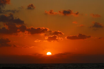 The sun sets below the horizon on the Mediterranean Sea in northern Israel.