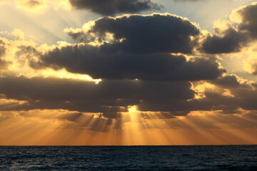 The sun sets below the horizon on the Mediterranean Sea in northern Israel.