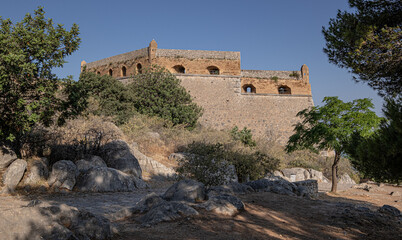 Fototapeta premium The Castle of Palamidi, the best well-maintained huge castle, the Venetian fortifications architectural masterpiece, located in Nafplio on the crest of a 216m cliff, Argolis, Peloponnese, Greece