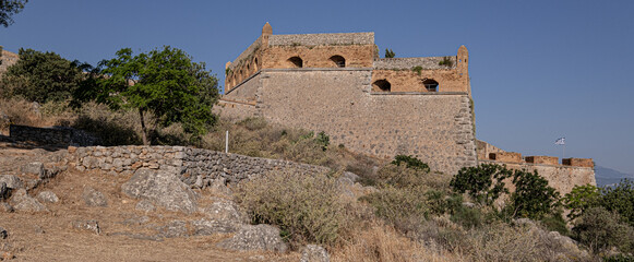 Fototapeta na wymiar The Castle of Palamidi, the best well-maintained huge castle, the Venetian fortifications architectural masterpice, located in Nafplio on the crest of a 216m cliff, Argolis, Peloponnese, Greece