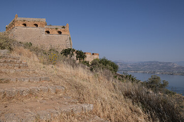 Fototapeta na wymiar The Castle of Palamidi, the best well-maintained huge castle, the Venetian fortifications architectural masterpice, located in Nafplio on the crest of a 216m cliff, Argolis, Peloponnese, Greece