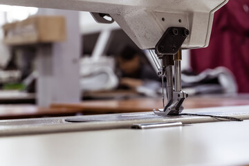 Sewing machine needles close-up in the workshop