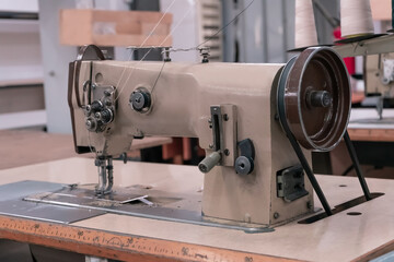Fototapeta premium Old sewing machine in the workshop